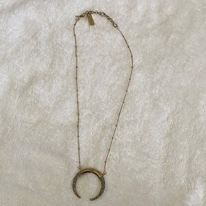 Jessica Simpson gold horizontal crescent moon chain necklace with stone details